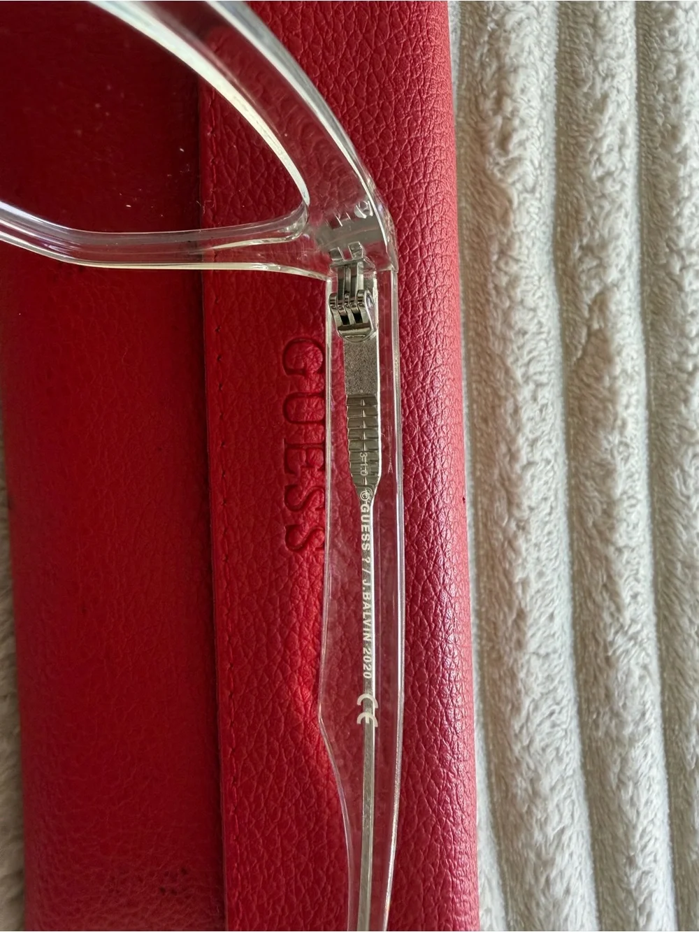 Guess transparent framed